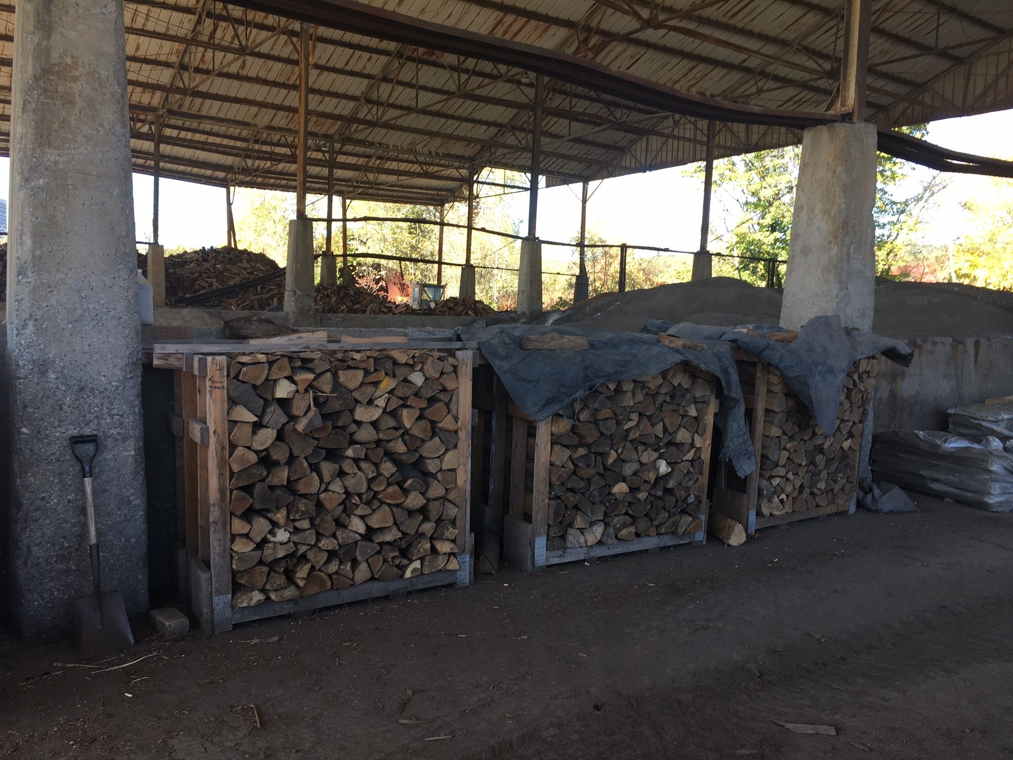 Firewood stored in face cord racks
